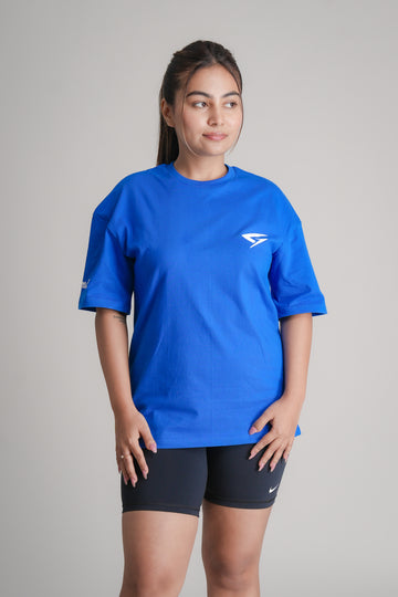 GRYND Faith Blue Oversized T-Shirt for Women – 100% cotton gym wear with relaxed fit, ideal for fitness and daily wear.