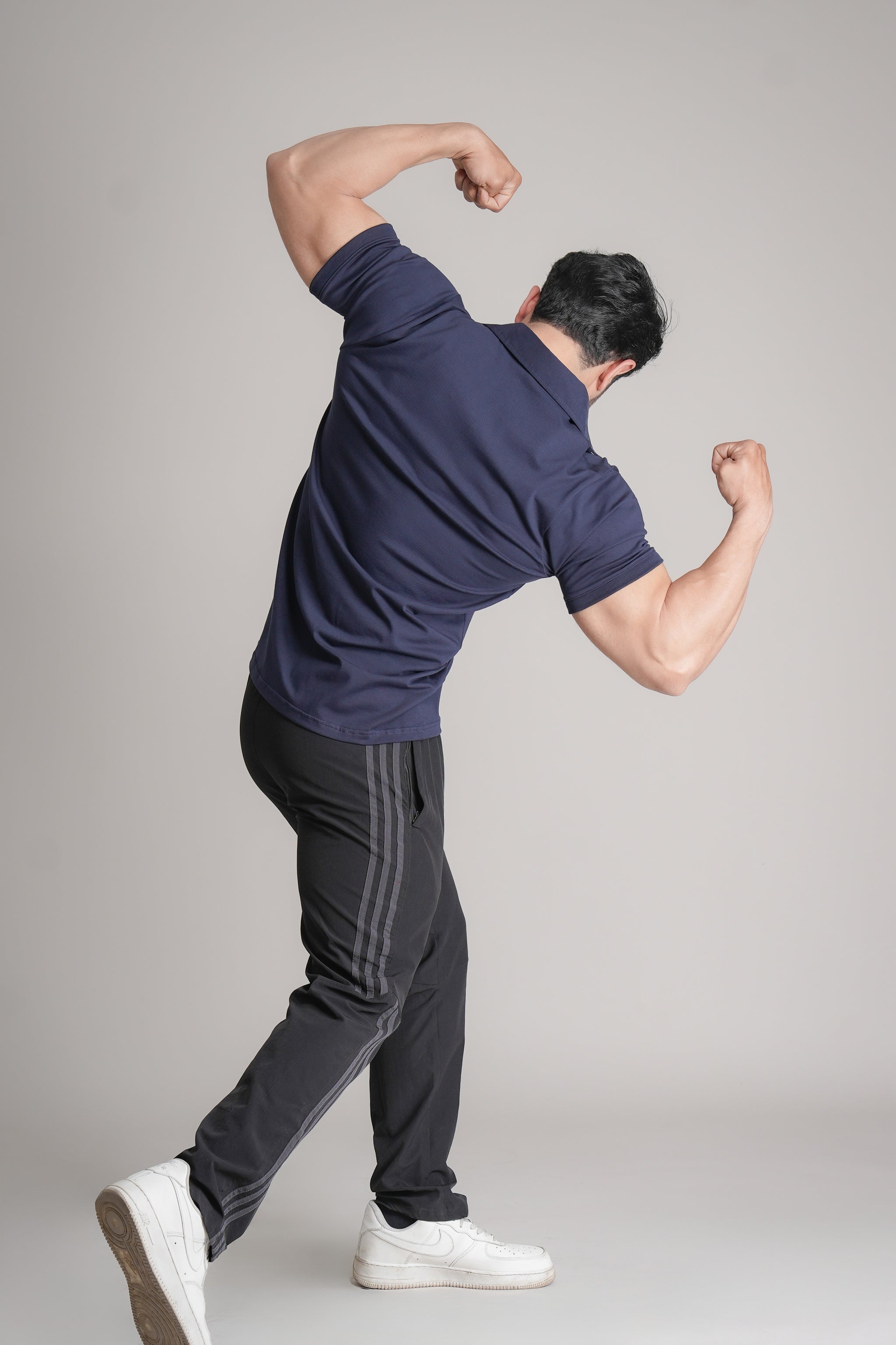 GRYND Navy Blue Slim Fit Polo T-Shirt – breathable cotton activewear, designed for gym workouts and everyday comfort.