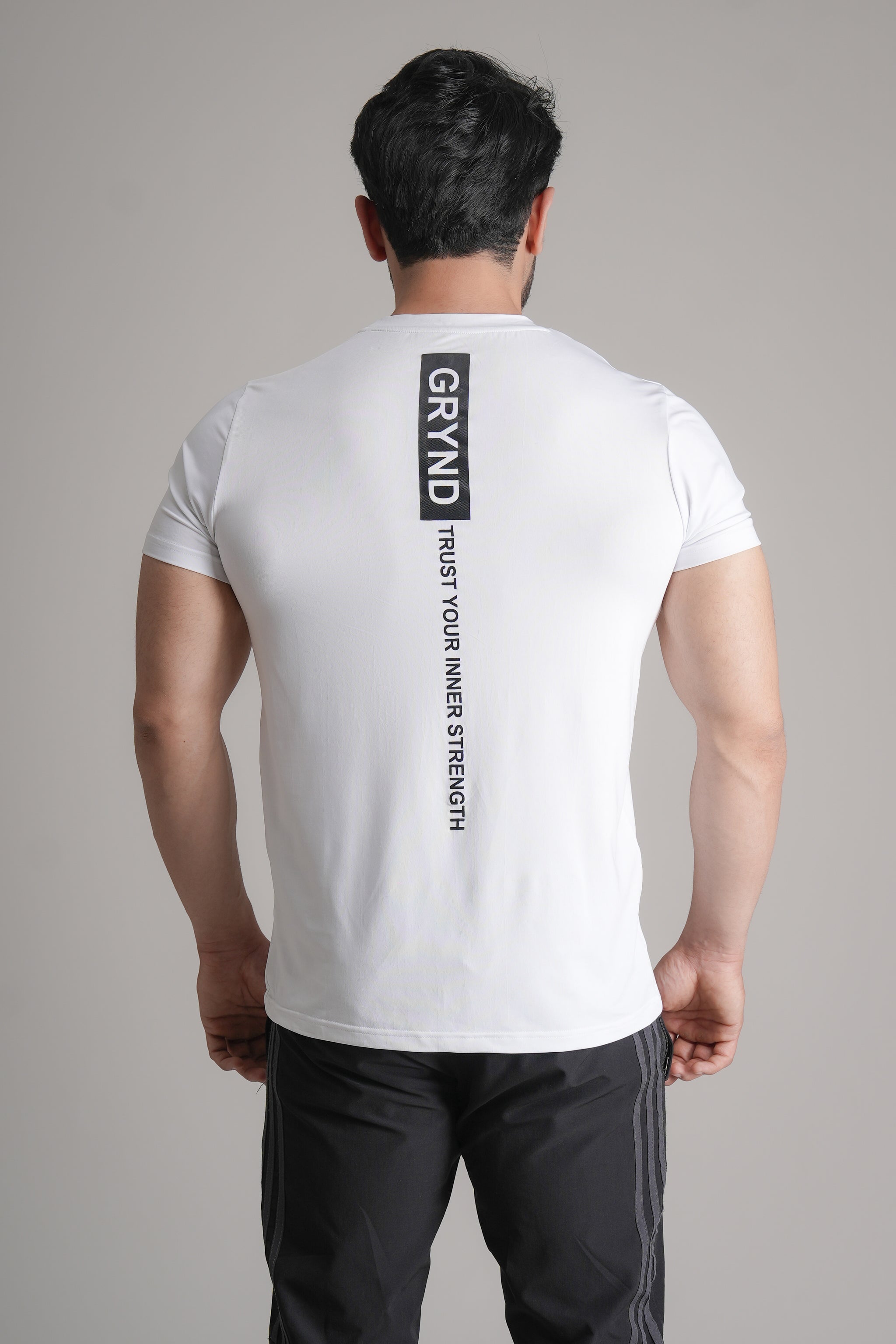 GRYND Dri-Fit White Gym T-Shirt – breathable, sweat-wicking activewear perfect for gym training and summer fitness.