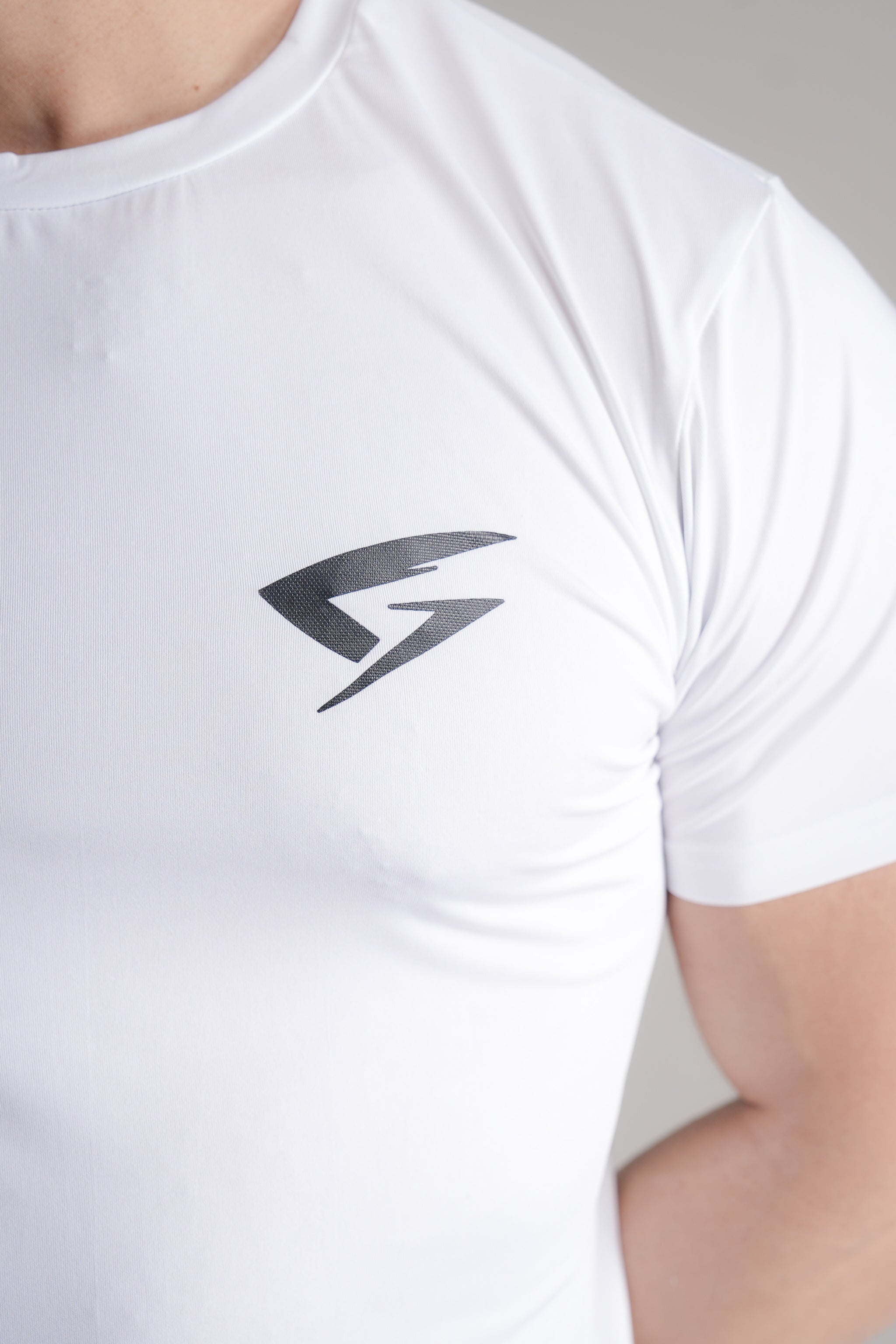 GRYND Dri-Fit White Gym T-Shirt – breathable, sweat-wicking activewear perfect for gym training and summer fitness.