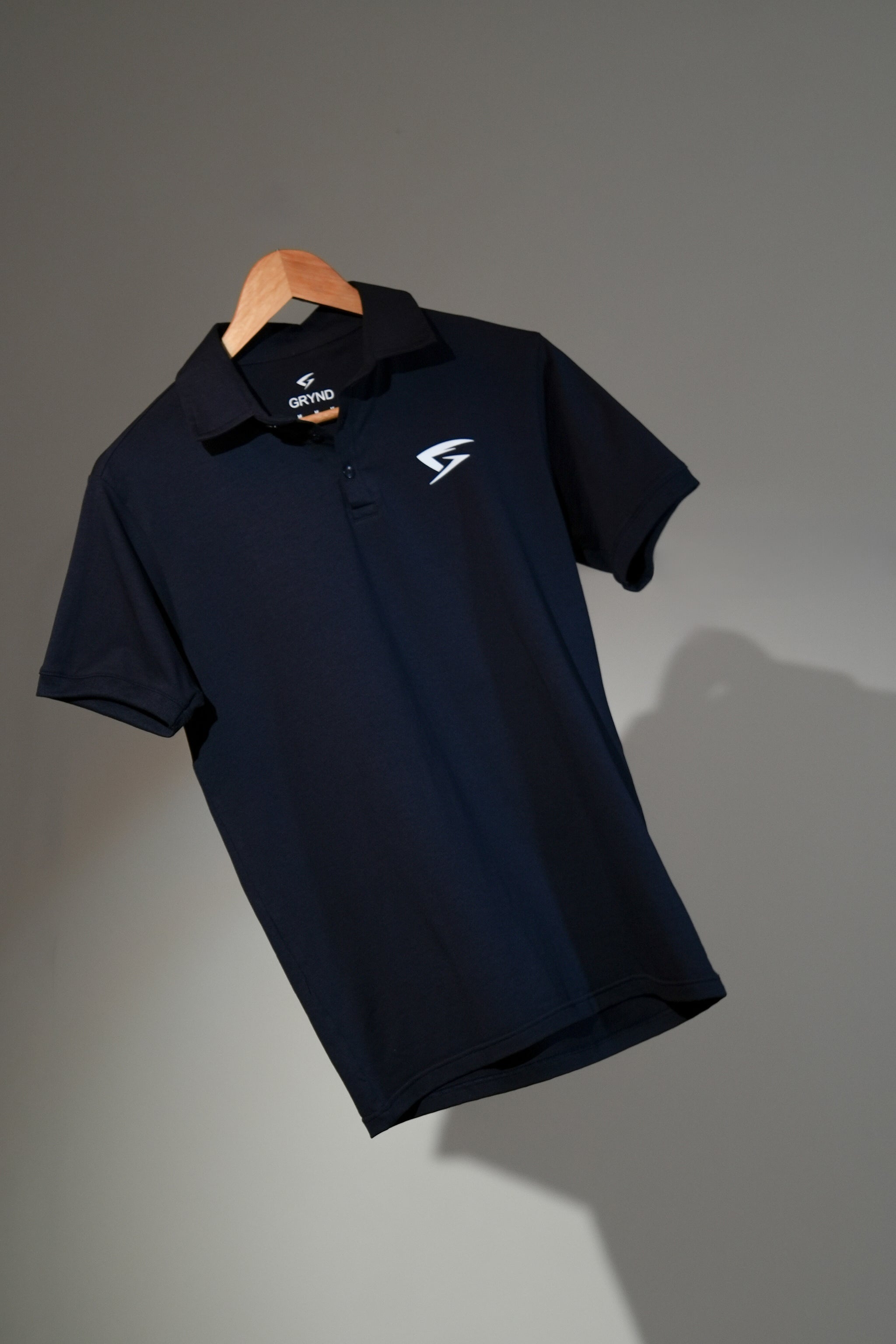 GRYND Navy Blue Slim Fit Polo T-Shirt – breathable cotton activewear, designed for gym workouts and everyday comfort.